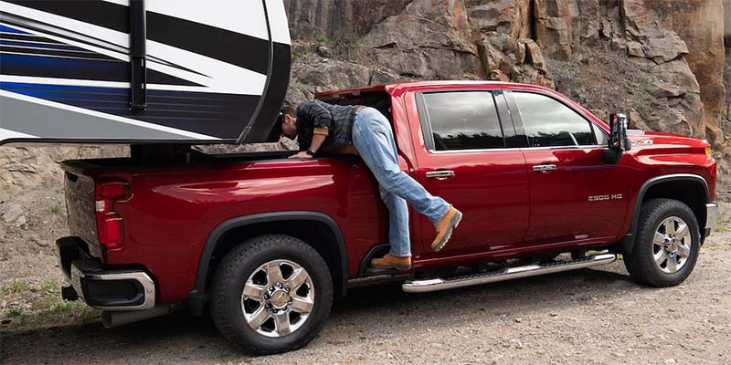 A Man on the Back of a Chevrolet Silverado 3500