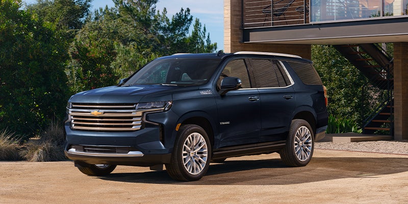2023 Chevrolet Tahoe Parked Near a House